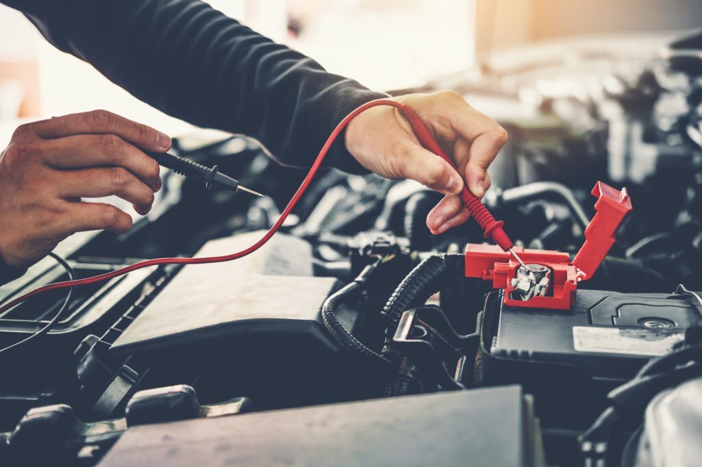 What is the difference between vehicle repair and maintenance?